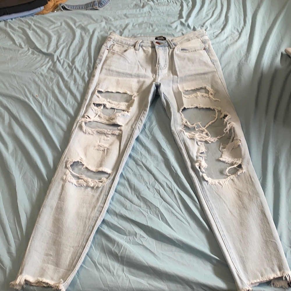 Lightly colored ripped jeans